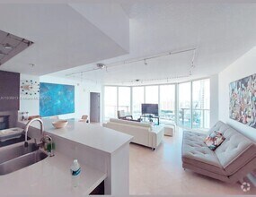 Building Photo - 16699 Collins Ave