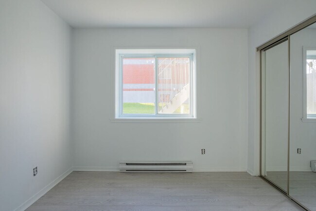 Photo du bâtiment - 91 AV JOLLIET