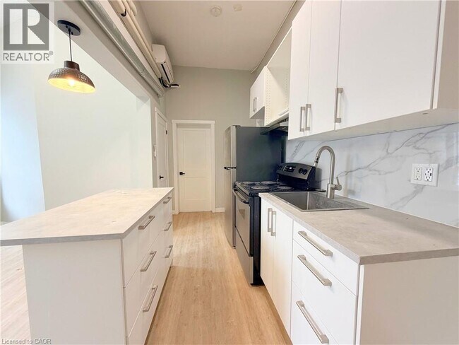 Photo du bâtiment - 117 Park St S