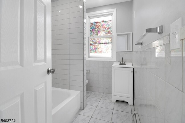 Building Photo - 144 Montgomery Ave