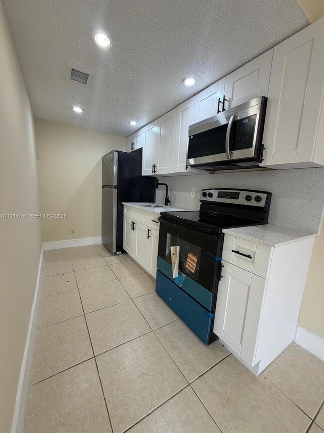 Building Photo - 2377 W 66th Pl