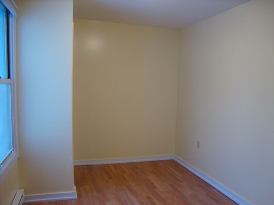1st Bedroom. Window and closet on left. - 130 N Shenango St