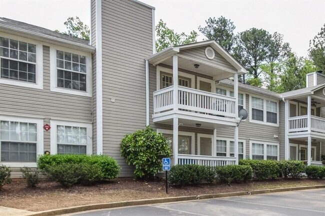 Building Photo - Top-Floor 2-Bed, 2-Bath Condo with Fireplace & Deck in Desirable Brookhaven Location!!