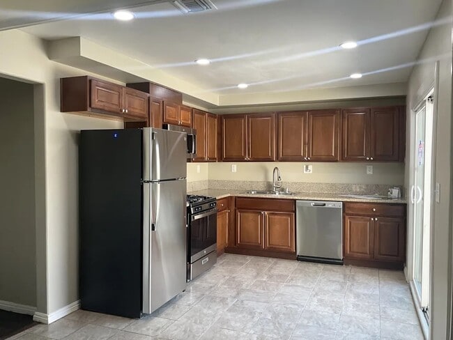 Building Photo - 9234 Kewen Ave