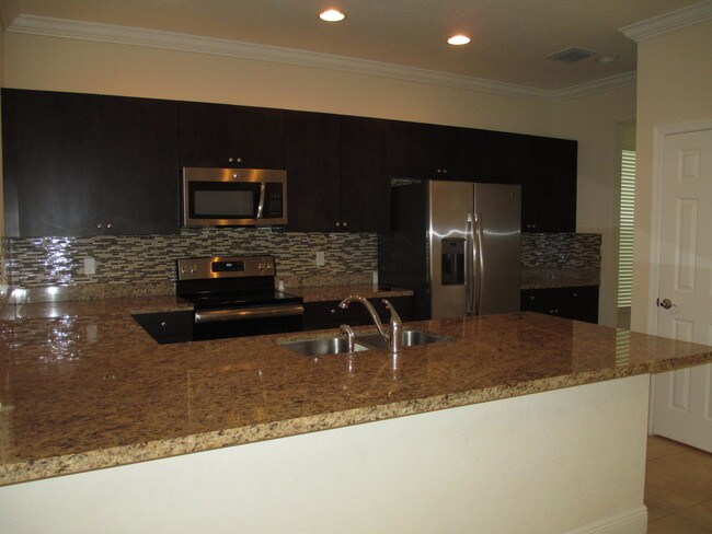 Building Photo - 1501 NW Cataluna Cir