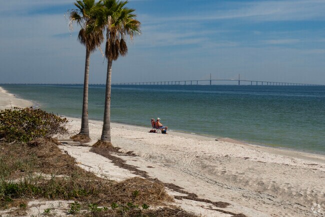 A couple enjoys a secluded spot at Ft DeSoto in Tierra Verde.