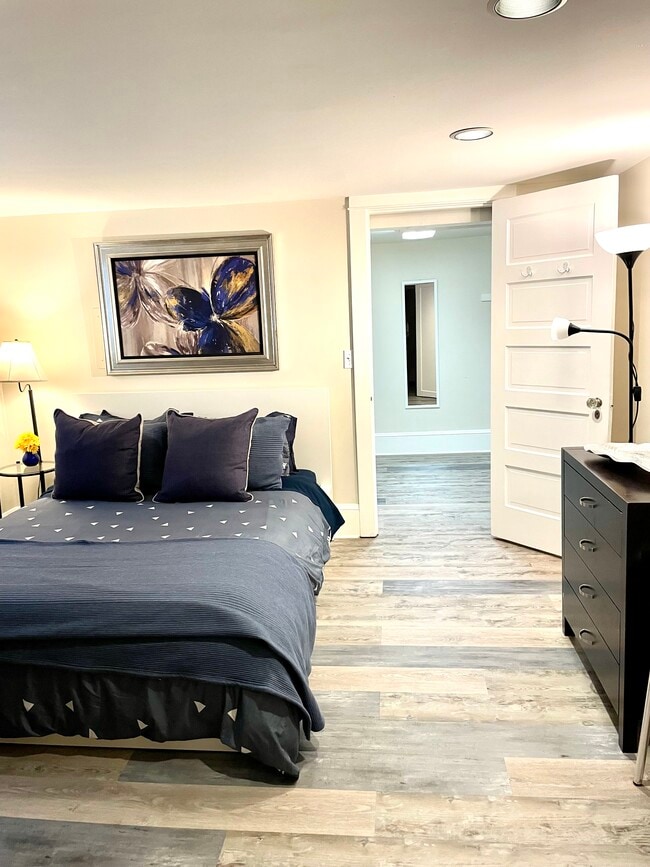 Bedroom with large walk in closet. - 2234 NE 44th Ave