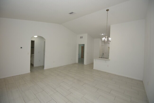 Building Photo - "Spacious 3-Bedroom Duplex Retreat in Palm...