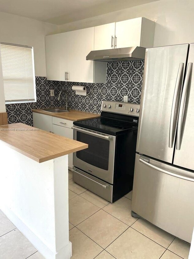 Foto principal - 310 NE 82nd St