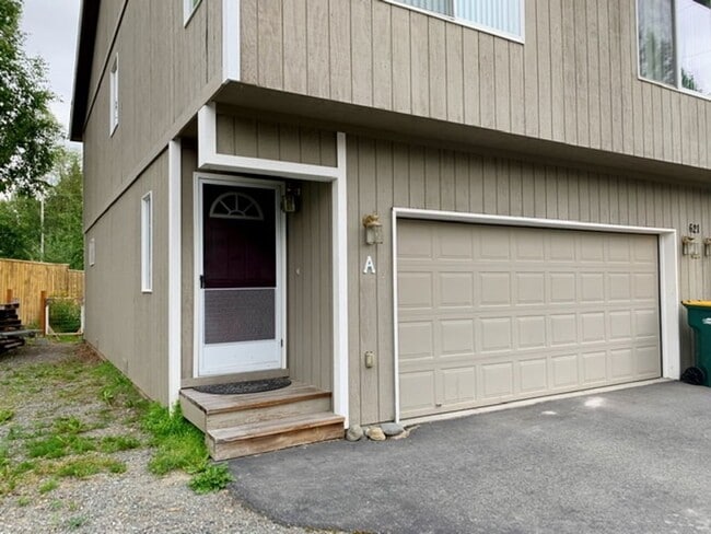 Building Photo - East Anchorage Townhouse with Yard, Garage, and W/D In unit! Close to JBER!