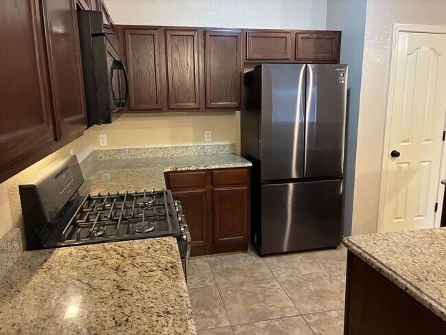 Building Photo - Santa Teresa Beauty 3 Bedrooms plus 2 and ...