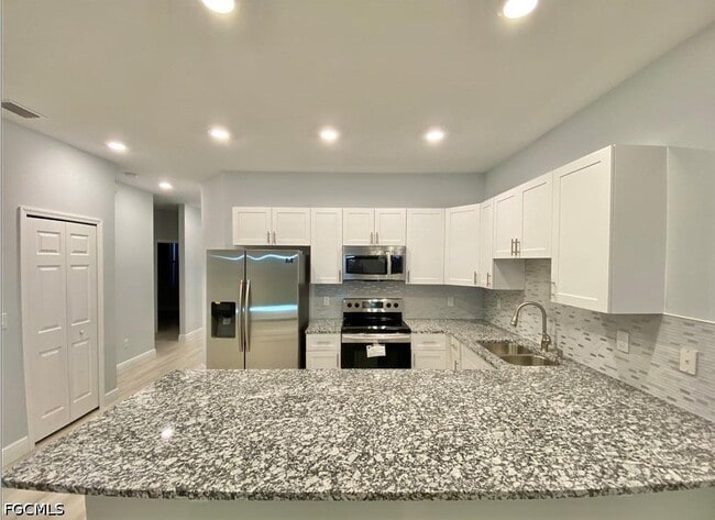 Building Photo - 2403 Dickens Ave N
