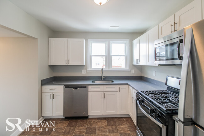 Building Photo - You will love this charming brick home