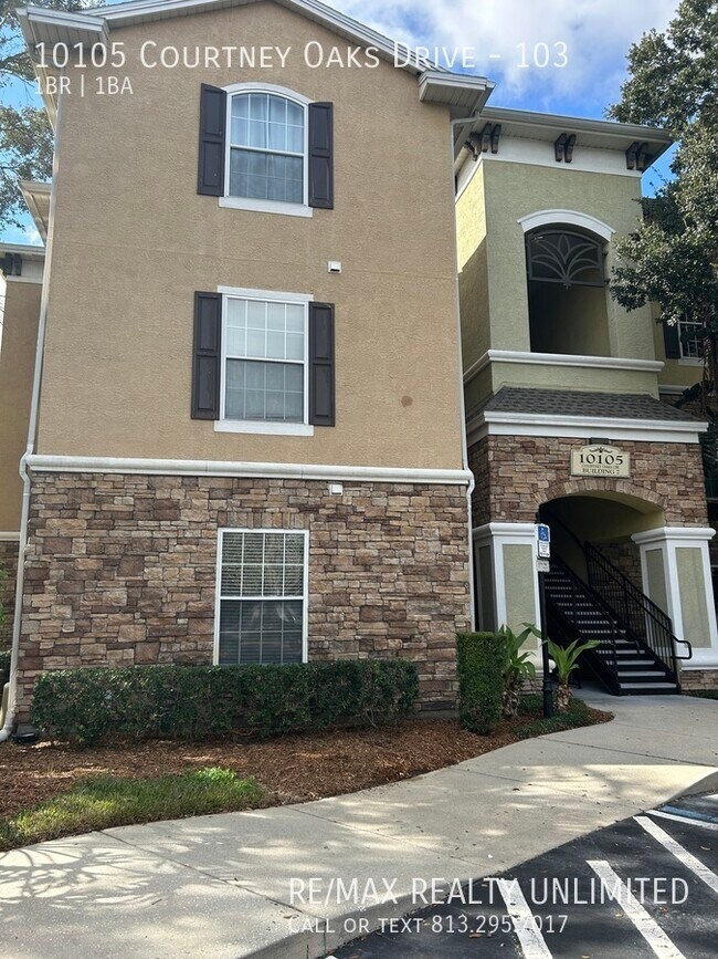 Building Photo - Courtney Palms - 10105 Courtney Oaks #103 ...