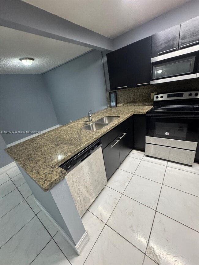 Building Photo - 5955 NW 25th Ct