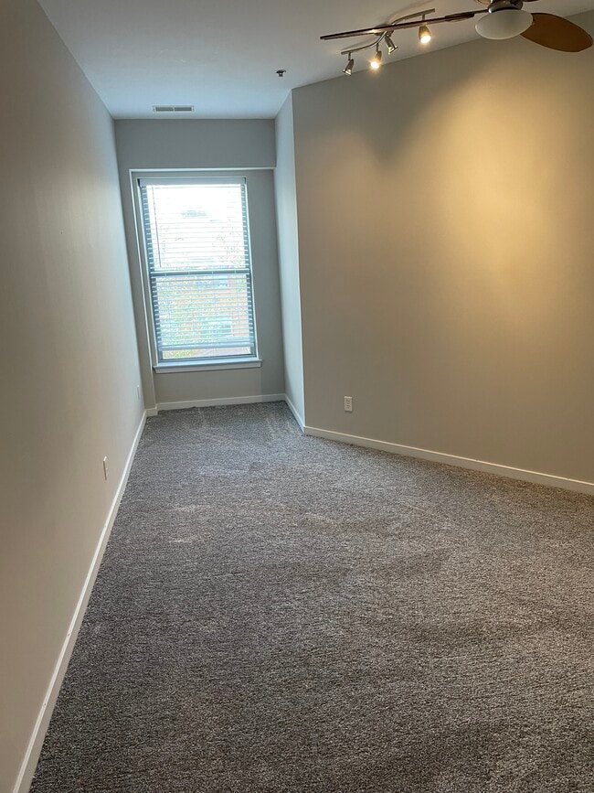 The master bedroom with new carpet - 849 Westgate Ave