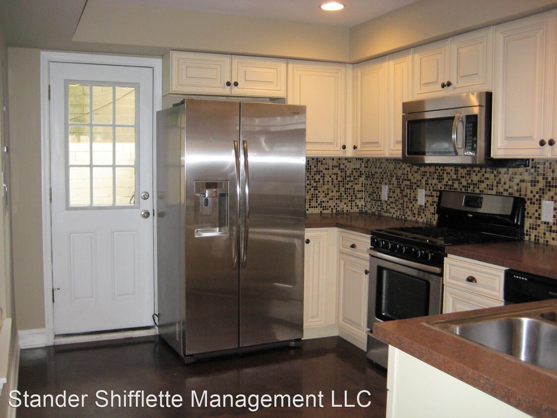Foto principal - 3 br, 2.5 bath House - 1028 Hollins Street