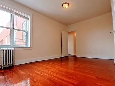 Building Photo - "Charming 1-Bed Oasis in the Heart of Woodside, NY!"