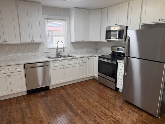 Building Photo - Updated Home Near Uptown with Fenced Backyard