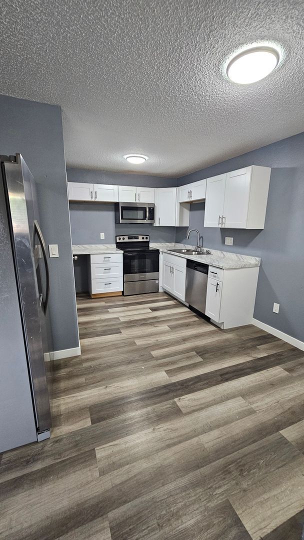 Foto del edificio - $1313 - 3BR/1BA Pet-Friendly 4Plex near Memorial Park in Colorado Springs