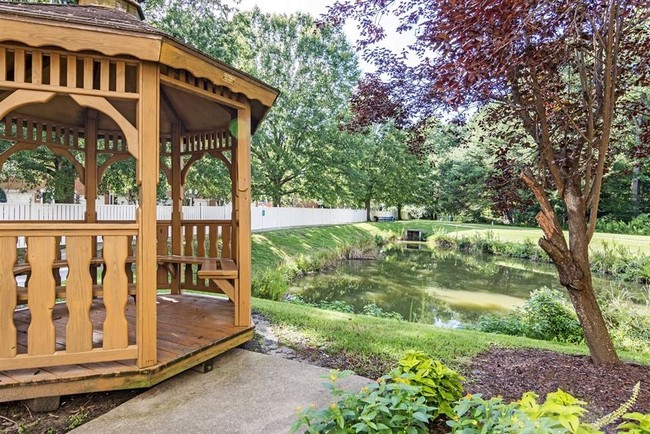 View of community pond and gazebo - Silver Hill at Arboretum Apartments