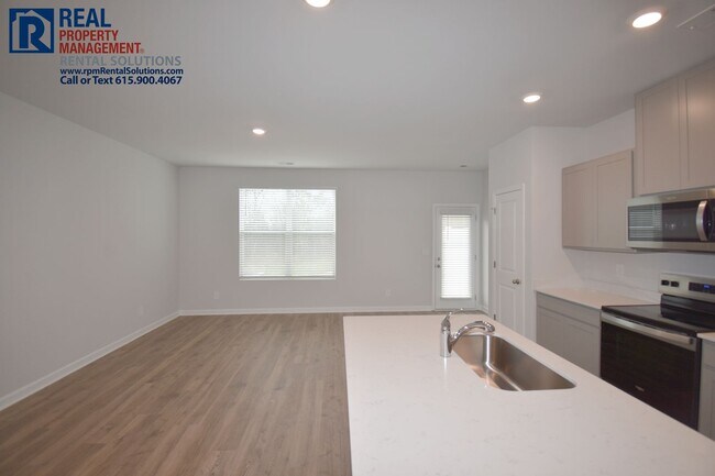 Building Photo - Brand new 3bd townhome w/ attached 2 car g...