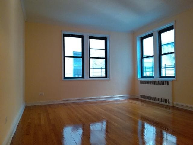 Building Photo - 8449 Elmhurst Ave