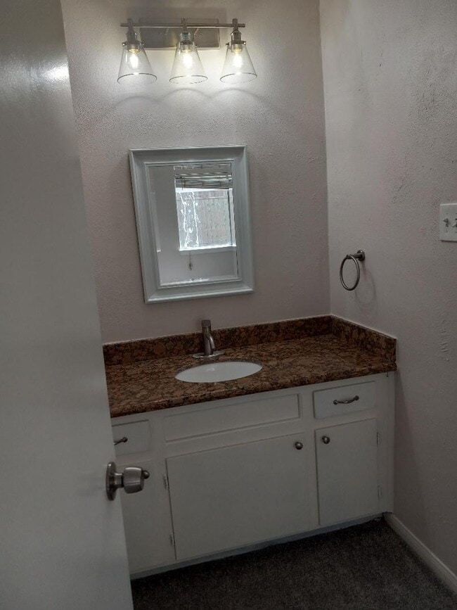 Master bathroom sink area - 403 Fir Ridge Dr