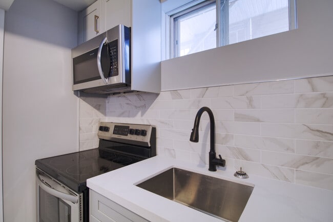 Building Photo - Modern 2 Bedroom Basement Unit– All Utilities & Parking Included – $1,899/month