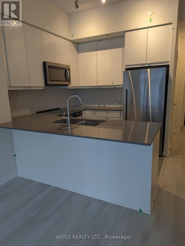 Building Photo - 3260 Sheppard Ave E