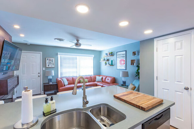 Open kitchen into living room - 3000 Golden Rd