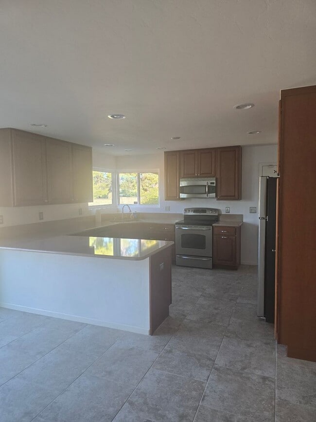 Foto del edificio - 9063 E Bellevue St