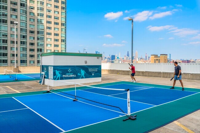 Stay active with a friendly match on our pickleball courts - Newport Rentals
