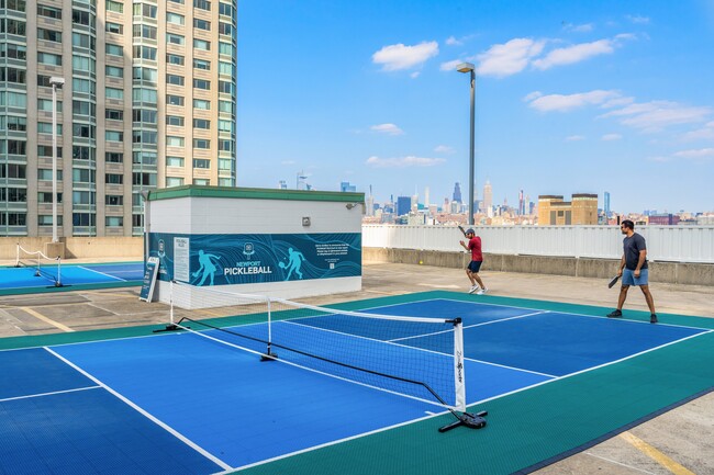 Stay active with a friendly match on our pickleball courts - Newport Rentals