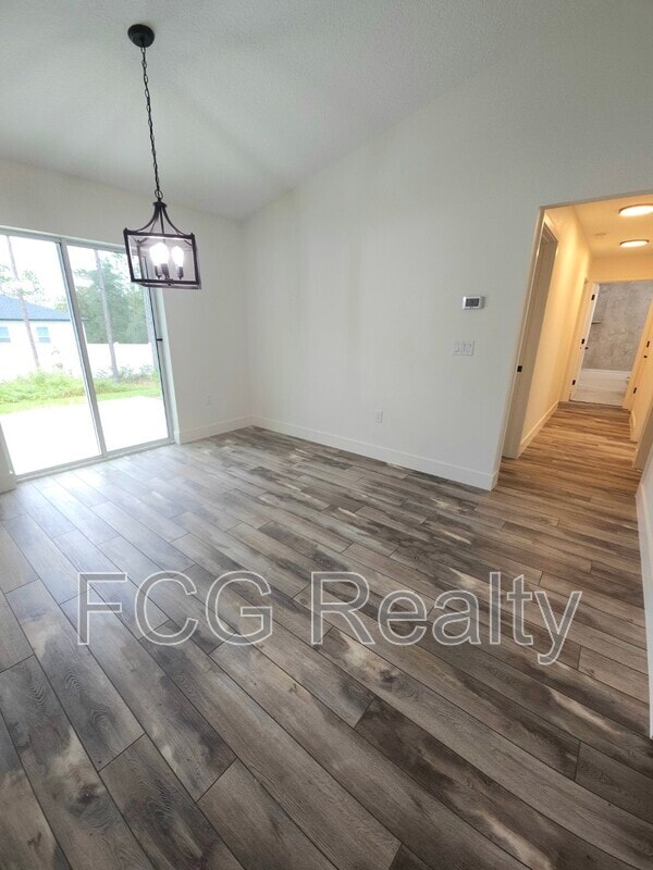 Building Photo - 7649 W Normandy Pl