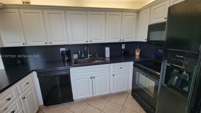 Foto del edificio - 9410 Tangerine Pl