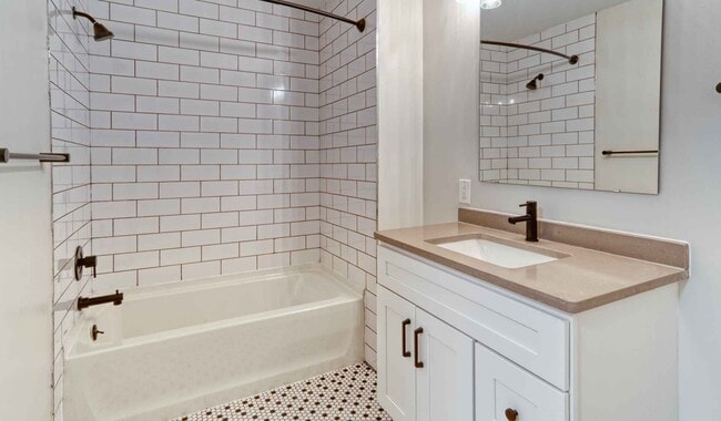 Renovated bathrooms with premium finishes are available for upgrade. Ask the leasing team for more details. - The Left Bank