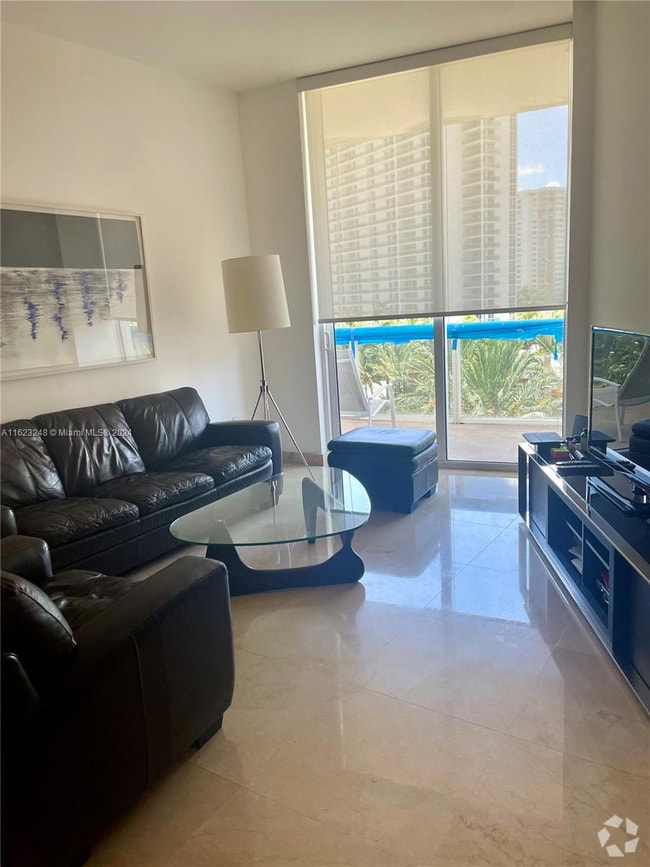 Building Photo - 15811 Collins Ave