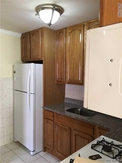 Foto del edificio - 217-33 Hollis Ave