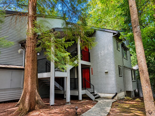 Building Photo - Modern Wooded Condo with Upgraded Kitchen & Private Deck
