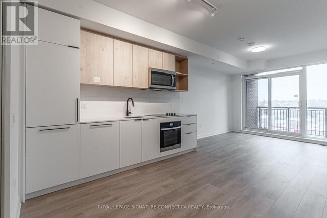 Building Photo - 1185 Dupont St