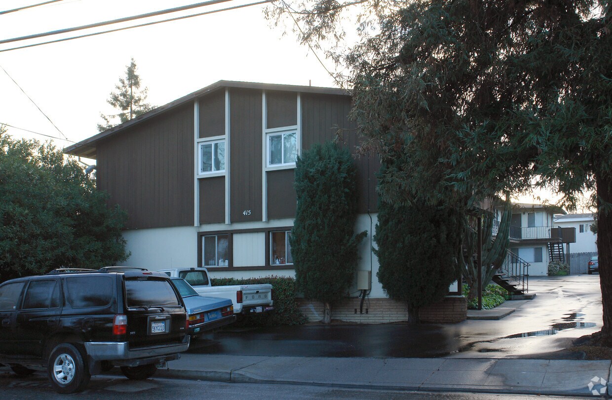 Big Tree cover the building. - 415 Del Medio Ave