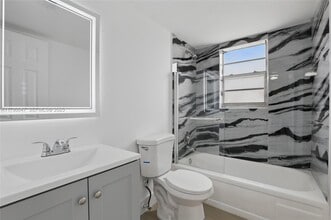 Building Photo - 8540 N Sherman Cir