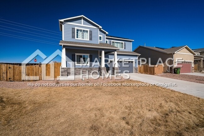 Foto del edificio - 9799 Desert Lily Cir