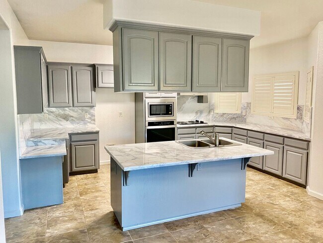 Foto del edificio - 4 br, 3 bath House - 1021 E Sarazen Ave