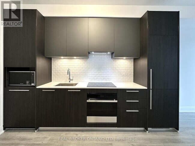 Photo du bâtiment - 65 Broadway Ave