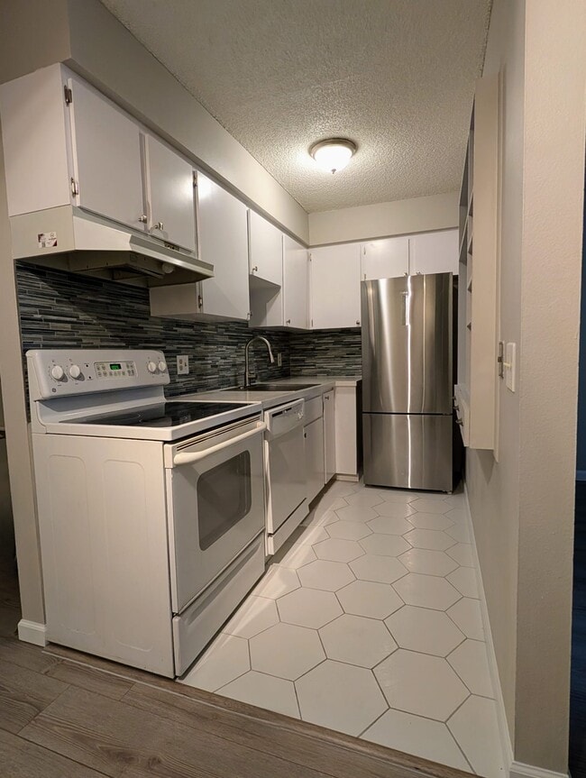 Photo - 5770 E Warren Ave Apartment