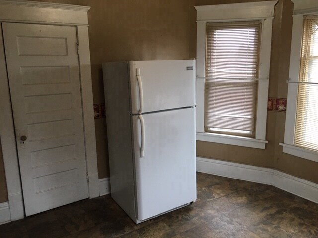 Kitchen with refrigerator - 240 S Union Ave