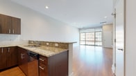 Step into a world where luxury meets convenience in this exquisite 1-bedroom, 1-bathroom apartment. Spanning 840 square feet, this urban sanctuary offers an unparalleled living experience that caters to the discerning homeowner.

As you enter, you're greeted by a flood of natural light streaming through expansive windows, illuminating the rich, warm tones of the gleaming hardwood floors. The open-concept living area seamlessly blends the kitchen and living room, creating an ideal space for both relaxation and entertaining.

The gourmet kitchen is a chef's dream, boasting sleek stainless steel appliances, elegant wood cabinetry, and a stunning granite countertop that doubles as a breakfast bar. The subway tile backsplash adds a touch of timeless sophistication, while the ample counter space invites culinary creativity.

The spacious 180 square foot bedroom is a tranquil retreat, featuring large windows that frame picturesque city views. A generously sized closet ensures ample storage for even the most extensive wardrobe.

The bathroom is a spa-like oasis, with modern fixtures, a large vanity, and high-end finishes that exude luxury. The neutral color palette throughout the apartment provides the perfect canvas for your personal style.

Every detail in this home has been carefully considered, from the recessed lighting to the climate control system, ensuring your comfort year-round. This is more than just a living space; it's an opportunity to elevate your lifestyle in one of the city's most desirable locations. Welcome home to 777 South Broad Street, where urban sophistication meets unparalleled comfort.