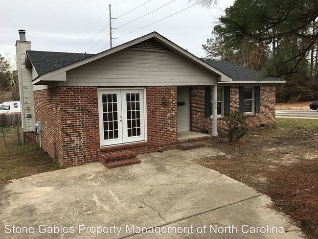 Building Photo - 3900 Village Dr